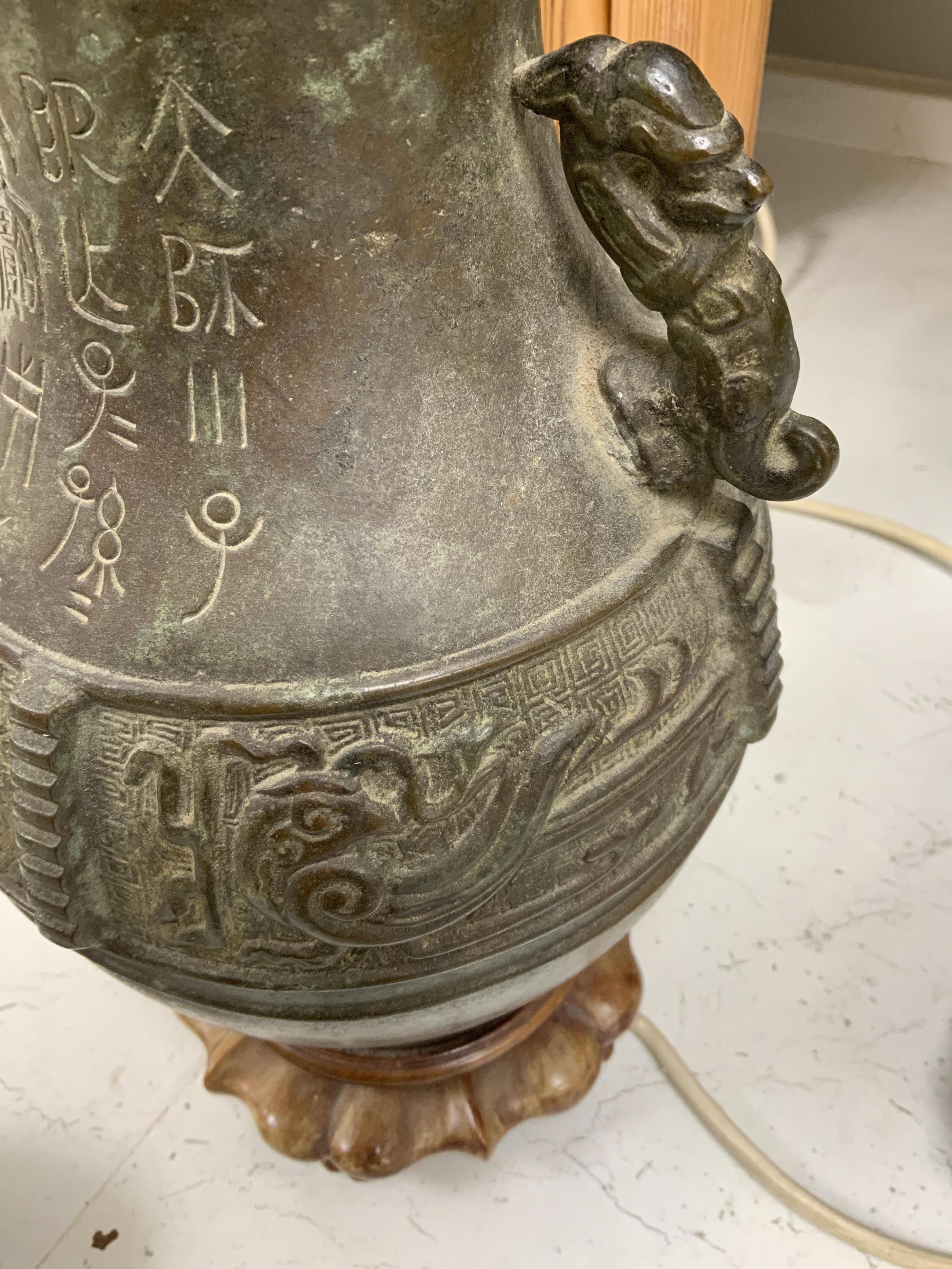 A Chinese archaistic bronze vase mounted as a table lamp, 62cm total